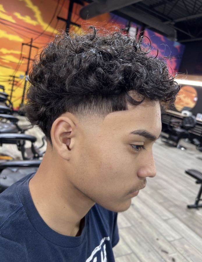 Textured curls with low fade